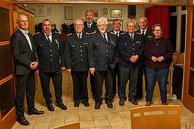Die Geehrten der Feuerwehr Kappeln-Kopperby mit Gratulanten Die Geehrten der Feuerwehr Kappeln-Kopperby mit Gratulanten