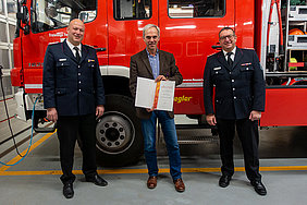 Kreiswehrführer Mark Rücker, Bürgermeister Heiko Traulsen und Gemeindewehrführer Dirk Schadewaldt (v.l.n.r.). Kreiswehrführer Mark Rücker, Bürgermeister Heiko Traulsen und Gemeindewehrführer Dirk Schadewaldt